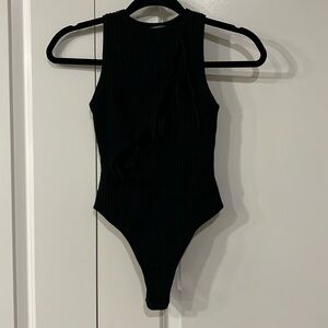 Lightly worn black ribbed with fancy knot front size S maniere de voir bodysuit